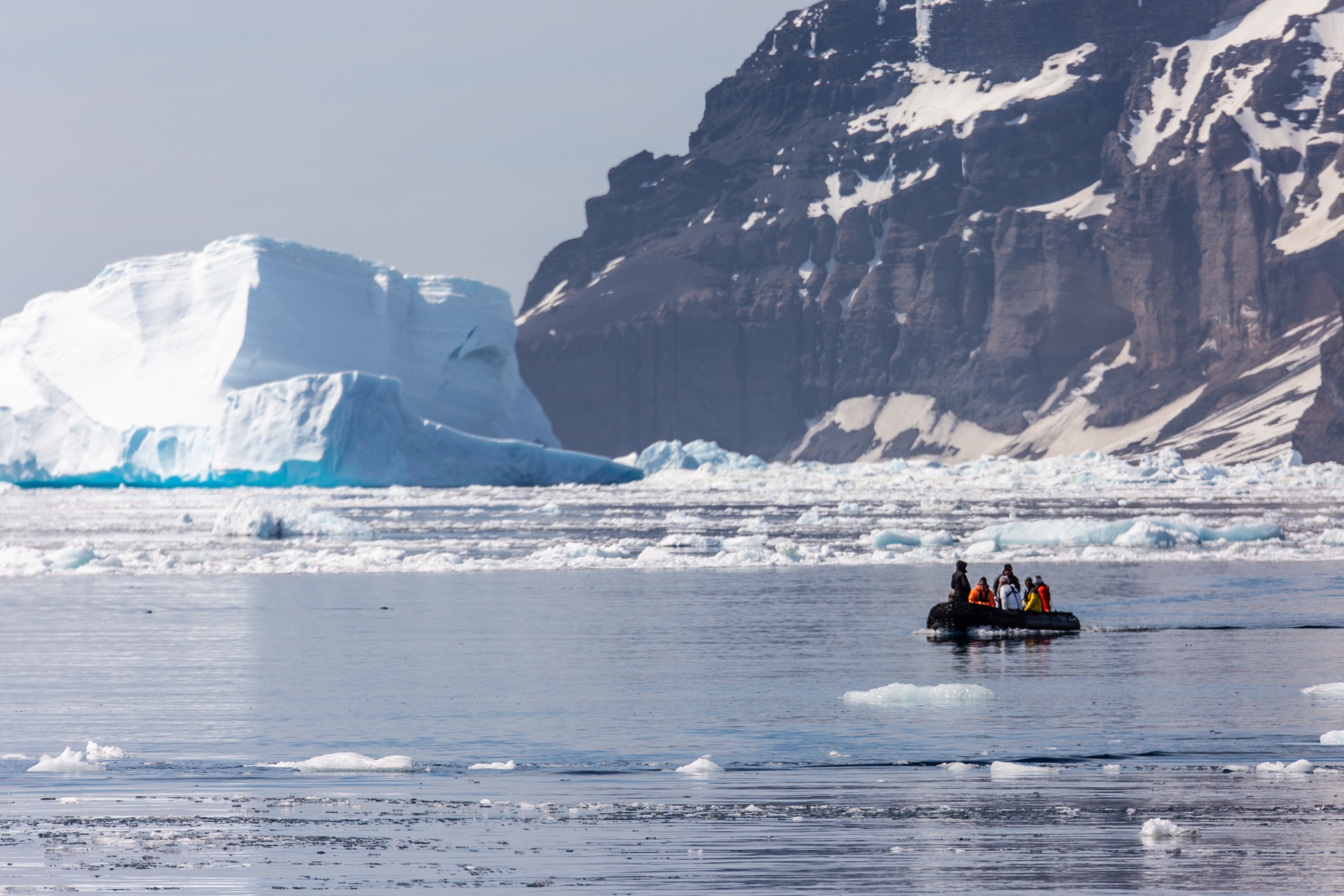 Expedition tender by an iceberg